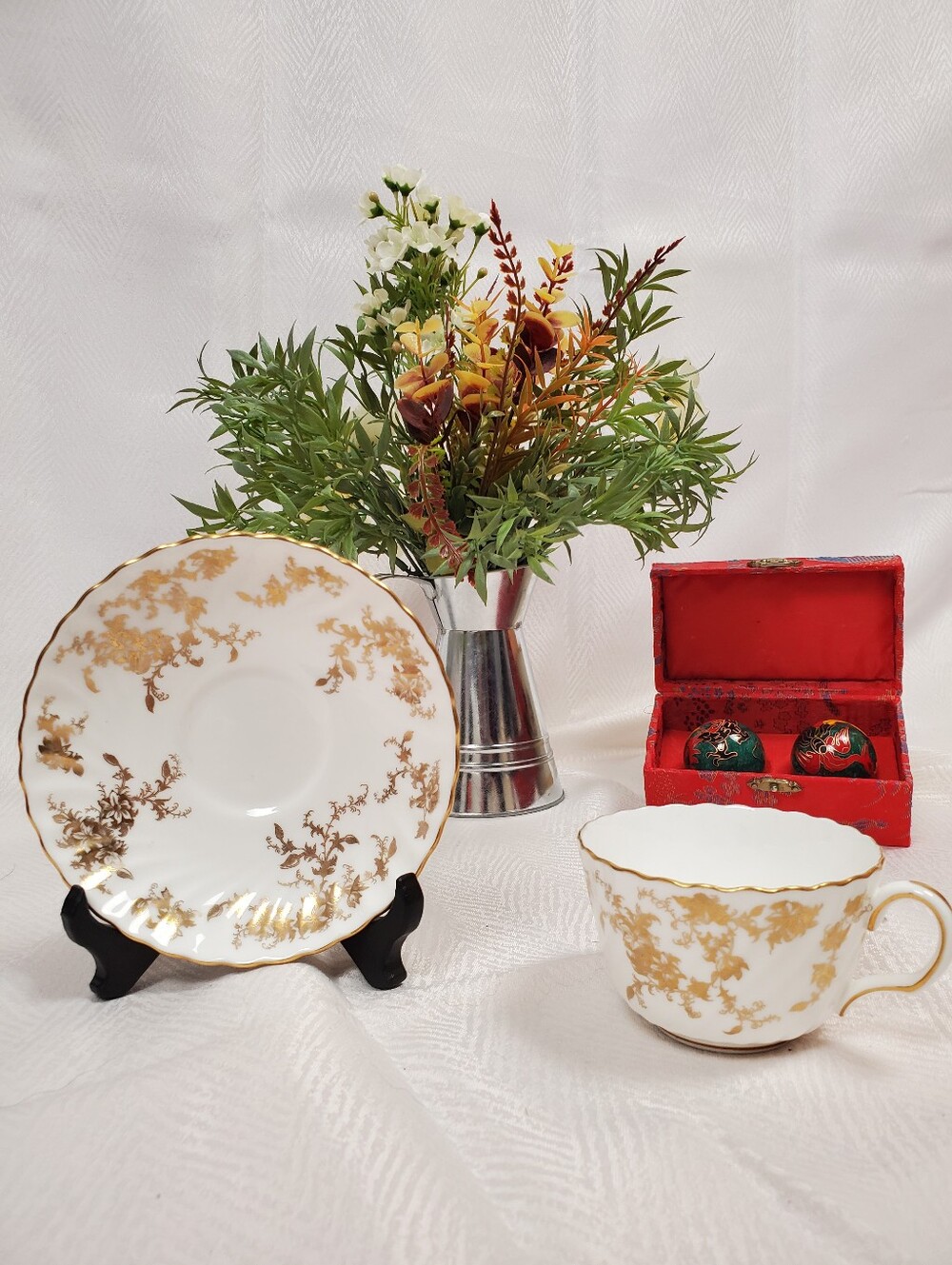 Elegant White and Gold Porcelain Teacup and Saucer Set